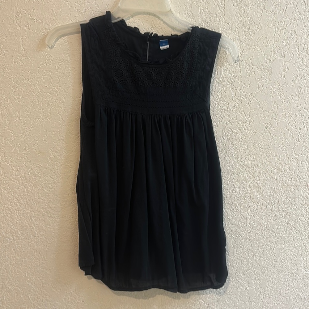 Black sleeveless blouse